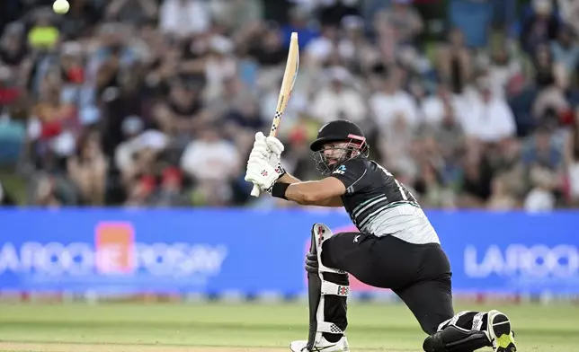 New Zealand's Daryl Mitchell bats during the first Twenty20 international cricket match between New Zealand and Sri Lanka at Mt Maunganui, New Zealand on Saturday, Dec. 28, 2024. (Andrew Cornaga/Photosport via AP)