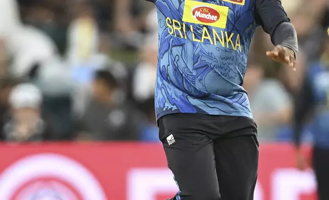 Sri Lanka's Wanindu Hasaranga bowls during the first Twenty20 international cricket match between New Zealand and Sri Lanka at Mt Maunganui, New Zealand on Saturday, Dec. 28, 2024. (Andrew Cornaga/Photosport via AP)