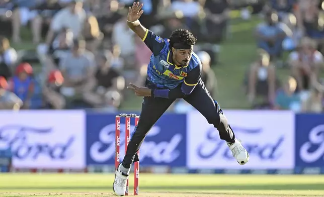 Sri Lanka's Avishka Fernando bowls during the first Twenty20 international cricket match between New Zealand and Sri Lanka at Mt Maunganui, New Zealand on Saturday, Dec. 28, 2024. (Andrew Cornaga/Photosport via AP)