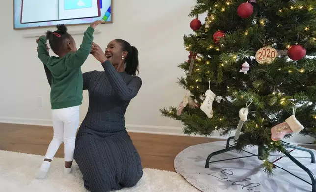 Michigan Supreme Court Justice Kyra Harris Bolden at home, Monday, Dec. 2, 2024, in Farmington, Mich. Justice Bolden is the first Black woman to be elected to the Michigan Supreme Court. (AP Photo/Carlos Osorio)