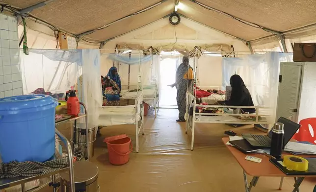 Patients are treated in an MSF-run clinic in the Aboutengue displacement site near Acre, Chad, Friday, Oct 4. 2024. (AP Photo/Sam Mednick)