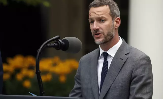 FILE - Adam Boehler, CEO of U.S. International Development Finance Corporation, speaks in the Rose Garden of the White House, April 14, 2020, in Washington. (AP Photo/Alex Brandon, File)