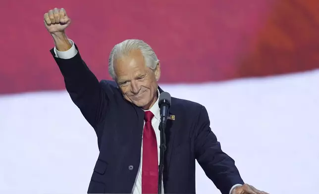 FILE - Peter Navarro raises his fist while speaking during the Republican National Convention, July 17, 2024, in Milwaukee. (AP Photo/J. Scott Applewhite, File)