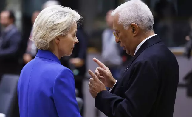 European Commission President Ursula von der Leyen, left, speaks with European Council President Antonio Costa during a round table meeting at an EU summit in Brussels, Thursday, Dec. 19, 2024. (AP Photo/Omar Havana)