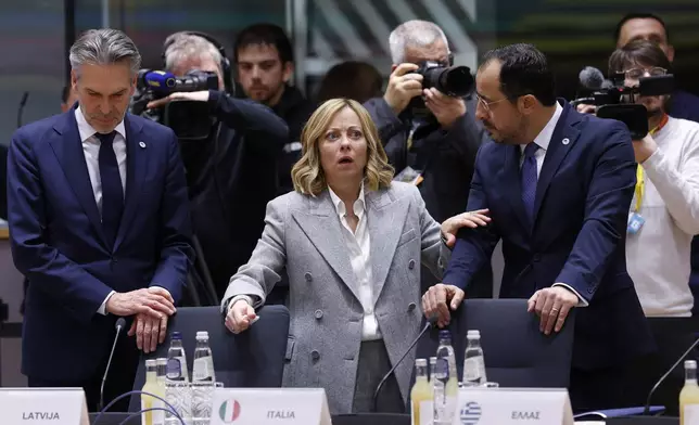 From left, Netherland's Prime Minister Dick Schoof, Italy's Prime Minister Giorgia Meloni and Cypriot President Nikos Christodoulides during a round table meeting at an EU summit in Brussels, Thursday, Dec. 19, 2024. (AP Photo/Omar Havana)