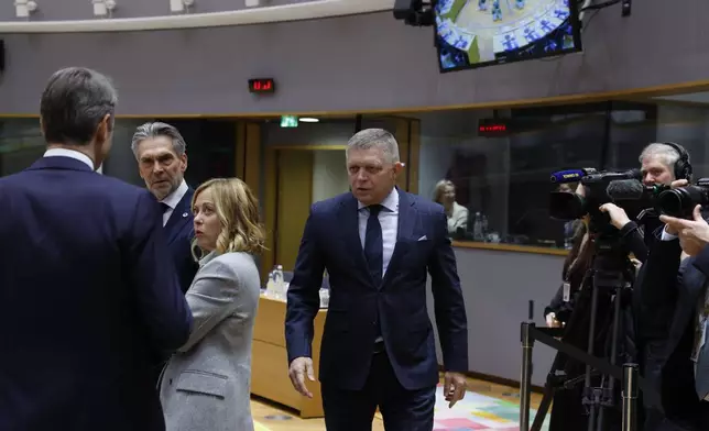 Slovakia's Prime Minister Robert Fico, center, arrives for a round table meeting at an EU summit in Brussels, Thursday, Dec. 19, 2024. (AP Photo/Omar Havana)