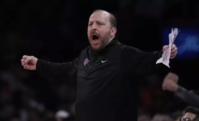 New York Knicks head coach Tom Thibodeau calls out to his team during the first half of an Emirates Cup NBA basketball game against the Atlanta Hawks Wednesday, Dec. 11, 2024, in New York. (AP Photo/Frank Franklin II)