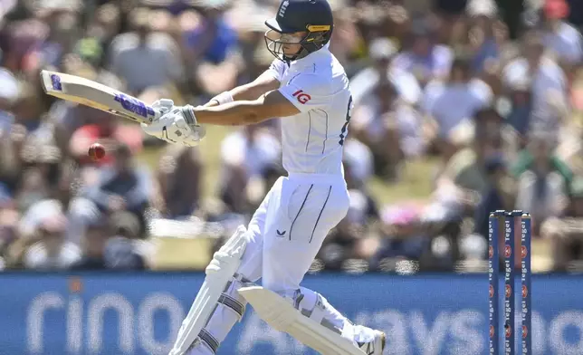 England's Jacob Bethell bats during play on the fourth day of the first cricket test between England and New Zealand at Hagley Oval in Christchurch, New Zealand, Sunday, Dec. 1, 2024.(John Davidson/Photosport via AP)