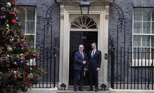 Britain's Prime Minister Keir Starmer welcomes his Greek counterpart Kyriakos Mitsotakis to 10 Downing Street in London, Tuesday, Dec. 3, 2024. (AP Photo/Kirsty Wigglesworth)