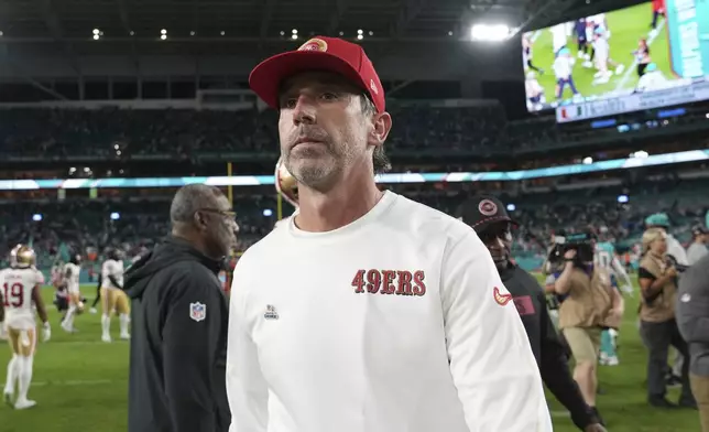 San Francisco 49ers head coach Kyle Shanahan leaves the field at the end of an NFL football game against the Miami Dolphins, Sunday, Dec. 22, 2024, in Miami Gardens, Fla. (AP Photo/Lynne Sladky)