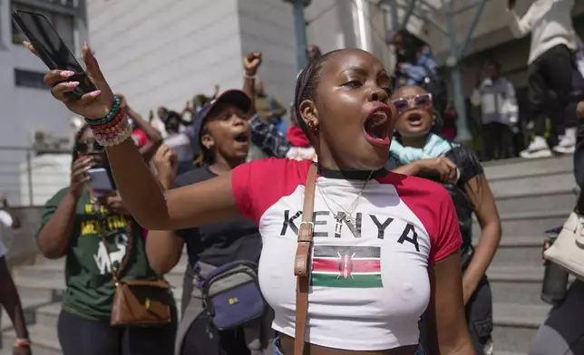 Demonstrators chant during a march against the rising cases of femicide, in downtown Nairobi, Kenya, Tuesday, Dec. 10, 2024. (AP Photo/Brian Inganga)