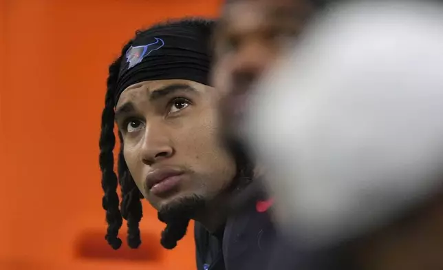 Houston Texans quarterback C.J. Stroud sits on the bench during the second half of an NFL football game against the Baltimore Ravens, Wednesday, Dec. 25, 2024, in Houston. (AP Photo/Eric Christian Smith)