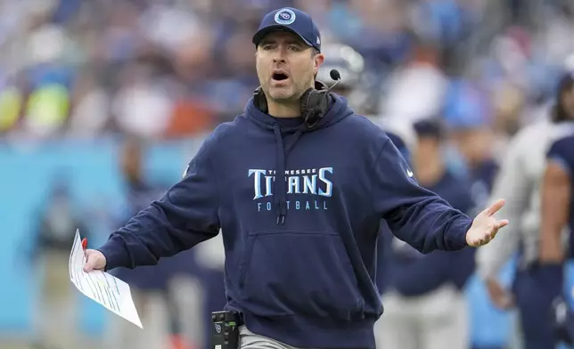 Tennessee Titans head coach Brian Callahan reacts during the first half of an NFL football game against the Cincinnati Bengals, Sunday, Dec. 15, 2024, in Nashville, Tenn. (AP Photo/George Walker IV)