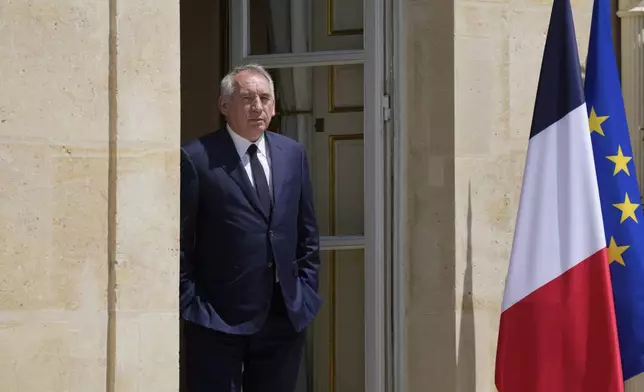 FILE - French centrist party MoDem (Mouvement Democrate) leader Francois Bayrou leaves after a meeting with France's President Emmanuel Macron at the Elysee Palace, in Paris, France, Tuesday, June 21, 2022. French President Emmanuel Macron names key centrist ally François Bayrou as new prime minister Friday Dec.13 2024. (AP Photo/Francois Mori, File)
