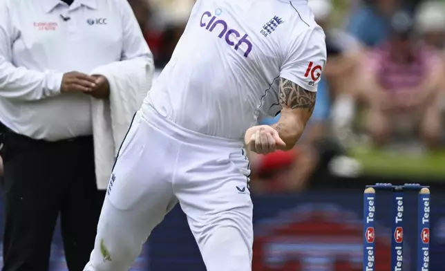 England's Ben Stokes bowls during play on day one of the third cricket test between England and New Zealand in Hamilton, New Zealand, Saturday, Dec. 14, 2024. (Andrew Cornaga/Photosport via AP)