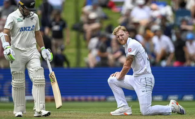 England's Ben Stokes reacts during play on day one of the third cricket test between England and New Zealand in Hamilton, New Zealand, Saturday, Dec. 14, 2024. (Andrew Cornaga/Photosport via AP)