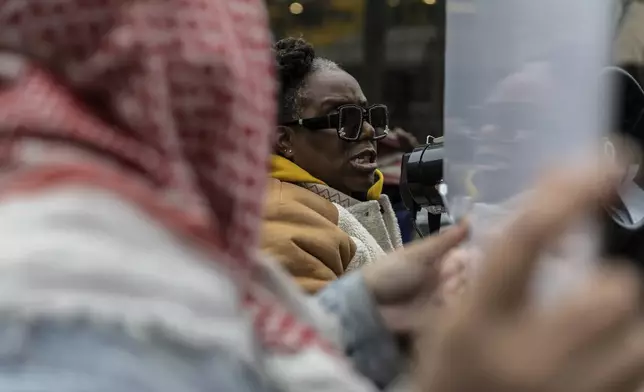 A person protests the not guilty verdict of Daniel Penny outside the criminal court, Monday, Dec. 9, 2024, in New York. (AP Photo/Stefan Jeremiah)