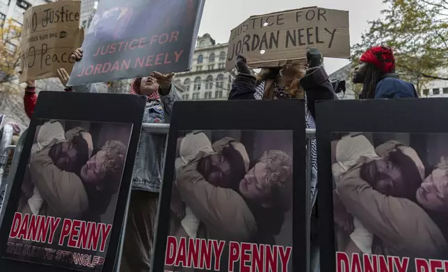 People protest the not guilty verdict of Daniel Penny outside the criminal court, Monday, Dec. 9, 2024, in New York. (AP Photo/Stefan Jeremiah)