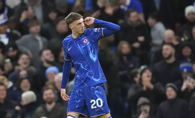 Chelsea's Cole Palmer celebrates after scoring the opening goal during the English Premier League soccer match between Chelsea and Fulham at Stamford Bridge stadium in London, Thursday, Dec. 26, 2024. (AP Photo/Kirsty Wigglesworth)