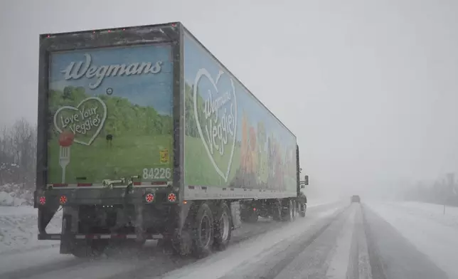 A truck travels on interstate 90 near New York-Pennsylvania border in Ripley, N.Y., Monday, Dec 2, 2024. (AP Photo/Gene J. Puskar)