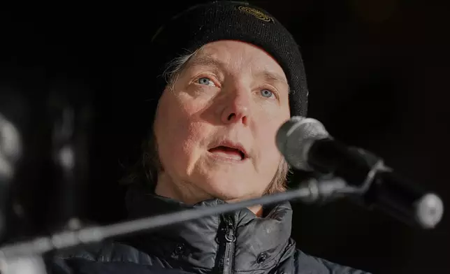 Madison Mayor Satya Rhodes-Conway speaks during a candlelight vigil Tuesday, Dec. 17, 2024, outside the Wisconsin Capitol in Madison, Wis., following a shooting at the Abundant Life Christian School on Monday, Dec. 16. (AP Photo/Morry Gash)