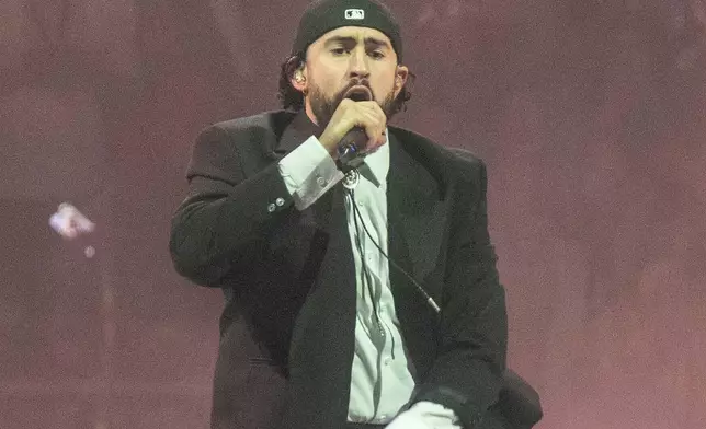 FILE - Bad Bunny performs during "The Most Wanted Tour" at State Farm Arena in Atlanta on May 15, 2024. (Photo by Paul R. Giunta/Invision/AP, File)