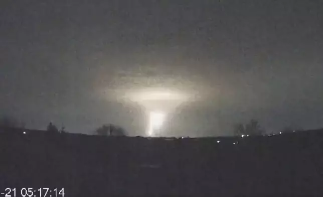 FILE - This image made from a video provided by the Come Back Alive Foundation shows lights in the sky during a Russian missile attack on a factory in the city of Dnipro, Ukraine, on Nov. 21, 2024. (Ukrainian Emergency Service via AP, File)