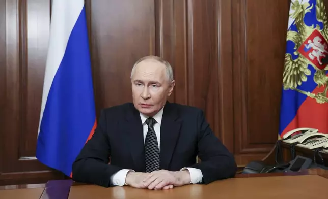 FILE - Russian President Vladimir Putin addressees the nation from the Kremlin in Moscow, Russia, on Nov. 21, 2024, about the use of a new hypersonic missile in Ukraine. (Vyacheslav Prokofyev, Sputnik, Kremlin Pool Photo via AP, File)