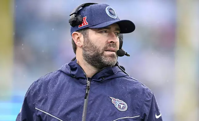 Tennessee Titans head coach Brian Callahan looks to the field from the sideline during the first half of an NFL football game against the Jacksonville Jaguars, Sunday, Dec. 29, 2024, in Jacksonville, Fla. (AP Photo/Phelan M. Ebenhack)