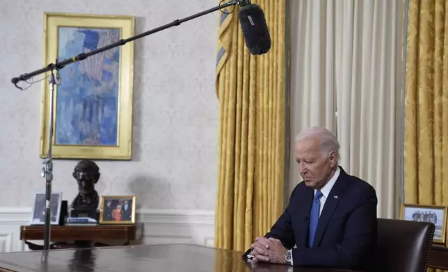 President Joe Biden pauses before he addresses the nation from the Oval Office of the White House in Washington, Wednesday, July 24, 2024, about his decision to drop his Democratic presidential reelection bid. (AP Photo/Evan Vucci, Pool)