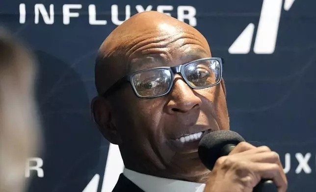 Former NFL and SMU running back Eric Dickerson speaks during a panel discussion about NIL and NCAA college football, Tuesday, Dec. 3, 2024, in Dallas. (AP Photo/LM Otero)