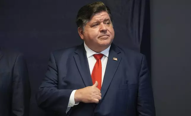 FILE - Illinois Gov. JB Pritzker waits to speak during a Democratic National Convention security briefing at the U.S. Secret Service's Chicago Field Office, in Chicago, July 25, 2024. (AP Photo/Erin Hooley, File)