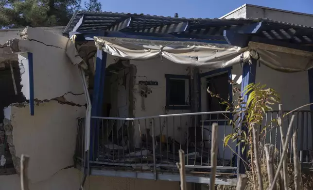 A damaged room of a house in the Kibbutz Manara, which is located near to the border with Lebanon, in northern Israel, Monday Dec. 2, 2024. (AP Photo/Ohad Zwigenberg)