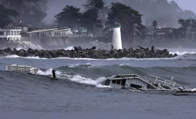 A building floats in the ocean after a wharf partially collapsed Monday, Dec. 23, 2024, in Santa Cruz, Calif. (Shmuel Thaler/The Santa Cruz Sentinel via AP)