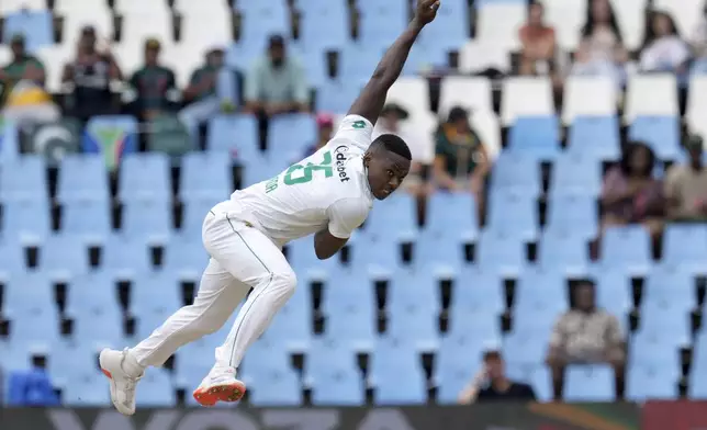 South Africa's Kagiso Rabada follows through his delivery during day three of the Test cricket match between South Africa and Pakistan, at the Centurion Park, in Centurion, South Africa, Saturday, Dec. 28, 2024. (AP Photo/Themba Hadebe)