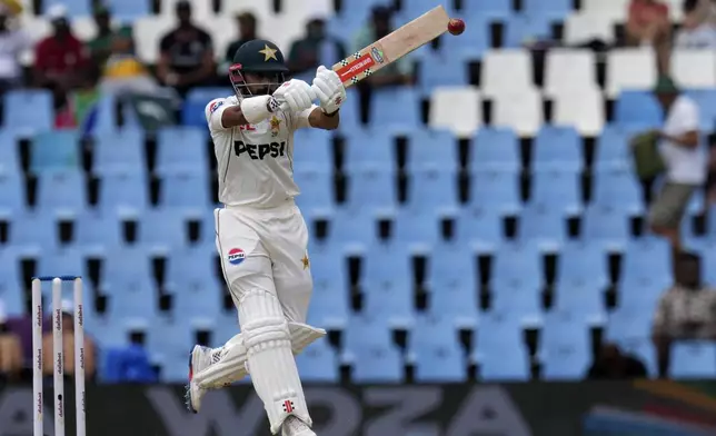 Pakistan's Saud Shakeel plays a high ball during day three of the Test cricket match between South Africa and Pakistan, at the Centurion Park, in Centurion, South Africa, Saturday, Dec. 28, 2024. (AP Photo/Themba Hadebe)