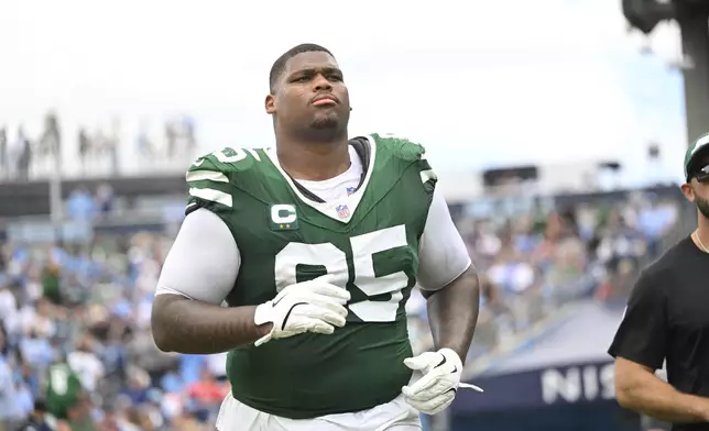 FILE -New York Jets defensive tackle Quinnen Williams (95) during an NFL football game against the Tennessee Titans Sunday, Sept. 15, 2024, in Nashville, Tenn. (AP Photo/John Amis, File)