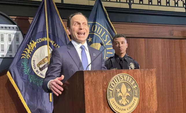 Louisville Mayor Craig Greenberg announces that the city has reached a consent decree agreement with the U.S. Justice Department on Thursday, Dec. 12, 2024, in Louisville, Ky. (AP Photo/Dylan Lovan)