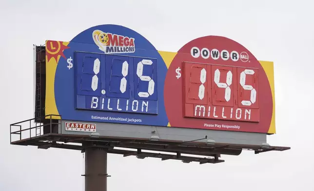 A billboard advertising the $1.15 billion Mega Millions jackpot is seen in Baltimore, Thursday, Dec. 26, 2024. (AP Photo/Stephanie Scarbrough)