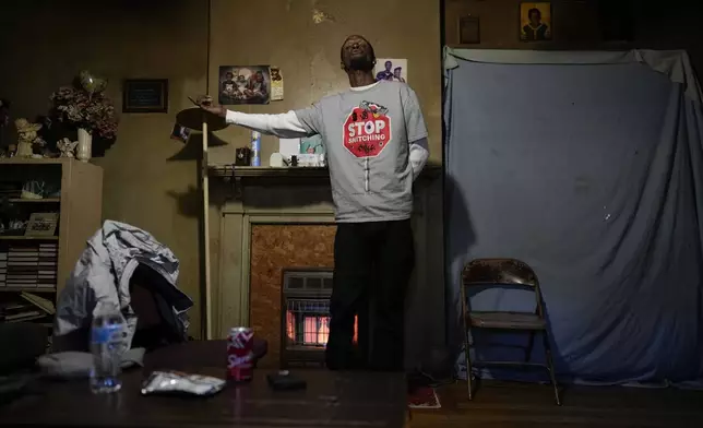 Tyrone Heard talks about the death of his uncle Willie Crayton as he stands in his living room, Friday, Dec. 6, 2024, in Alexander City, Ala. (AP Photo/Carolyn Kaster)