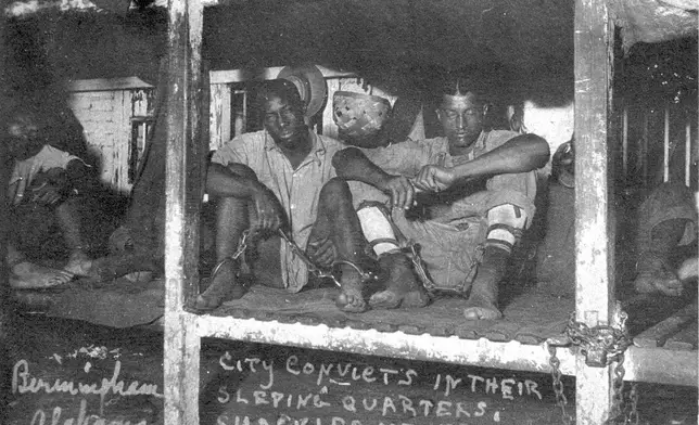 This July 1907 photo shows city convicts in their sleeping quarters in Birmingham, Ala. (Birmingham, Ala., Public Library Archives via AP)