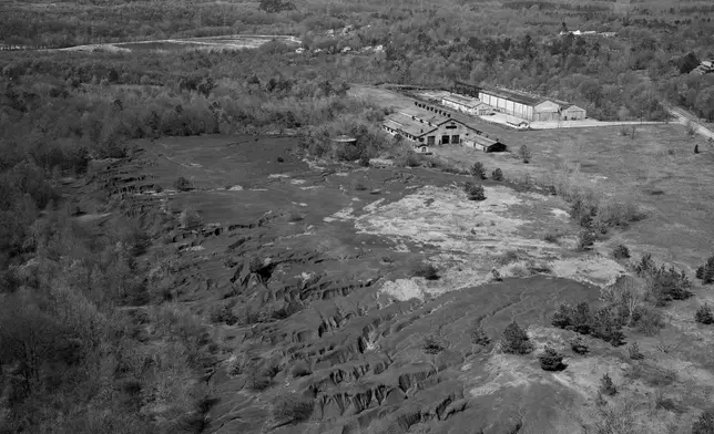 This undated government survey photo shows the Pratt Coal &amp; Coke Company, Pratt Mines, a beneficiary of convict leasing in Birmingham, Ala. (Library of Congress via AP)