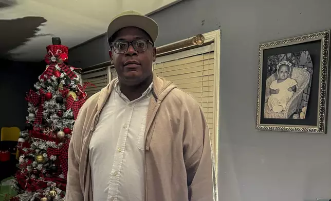 Arthur Ptomey stands for a photo at his mother's home, Saturday, Dec. 14, 2024 in Birmingham, Ala. Ptomey was on work release for several private companies over six years, then denied parole after refusing to take on shifts over a wage dispute. (Anonymous via AP)