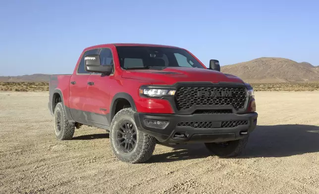 This photo provided by Ram shows the 2025 Ram 1500 Rebel. It features four-wheel drive, Bilstein shock absorbers, an electronic locking rear axle, all-terrain tires and a powerful six-cylinder engine. (Courtesy of Stellantis via AP)