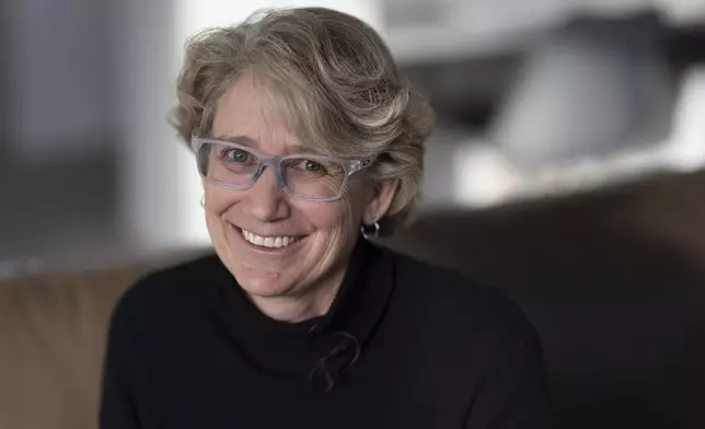 FILE - Two-time Olympian Joan Wilder poses for a photo at her home on Nov. 22, 2024, in Bend, Ore. (AP Photo/Jenny Kane, File)