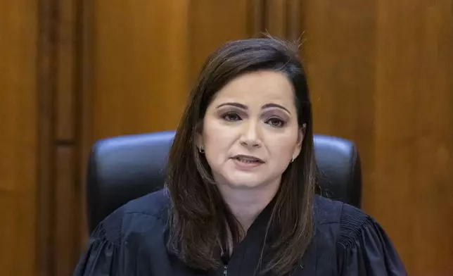 Judge Lody Jean speaks during a bond hearing for two Miami Beach, Fla., twin brothers Oren and Alon Alexander, 37, who are charged with multiple state and federal crimes, including sex trafficking and rape on Friday, Dec. 13, 2024, in Miami. (Matias J. Ocner/Miami Herald via AP, Pool)