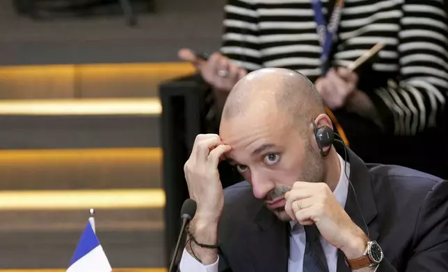 French Foreign Minister Jean-Noel Barrot waits for the start of a meeting of NATO foreign ministers at NATO headquarters in Brussels, Wednesday, Dec. 4, 2024. (AP Photo/Virginia Mayo)