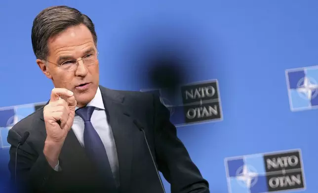 NATO Secretary General Mark Rutte speaks during a media conference at the conclusion of a meeting of NATO foreign ministers at NATO headquarters in Brussels, Wednesday, Dec. 4, 2024. (AP Photo/Virginia Mayo)