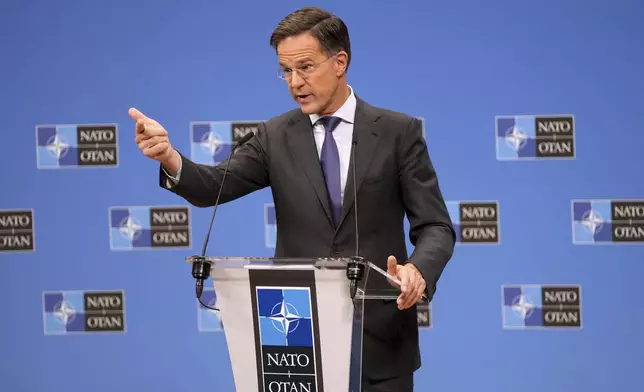 NATO Secretary General Mark Rutte speaks during a media conference at the conclusion of a meeting of NATO foreign ministers at NATO headquarters in Brussels, Wednesday, Dec. 4, 2024. (AP Photo/Virginia Mayo)