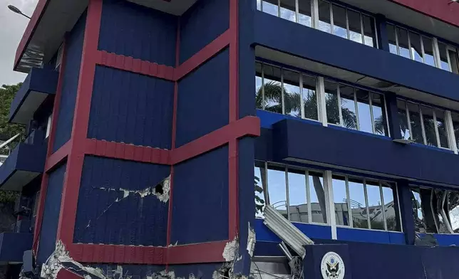 A building is seen damaged in Port Vila, Vanuatu, following a powerful earthquake Tuesday, Dec. 17, 2024. (Tim Cutler via AP)